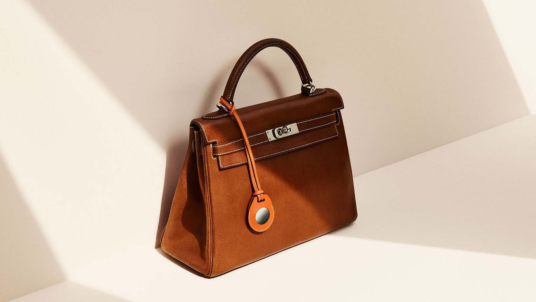 Lifestyle News - Hermès and Apple unveil AirTag accoutrements