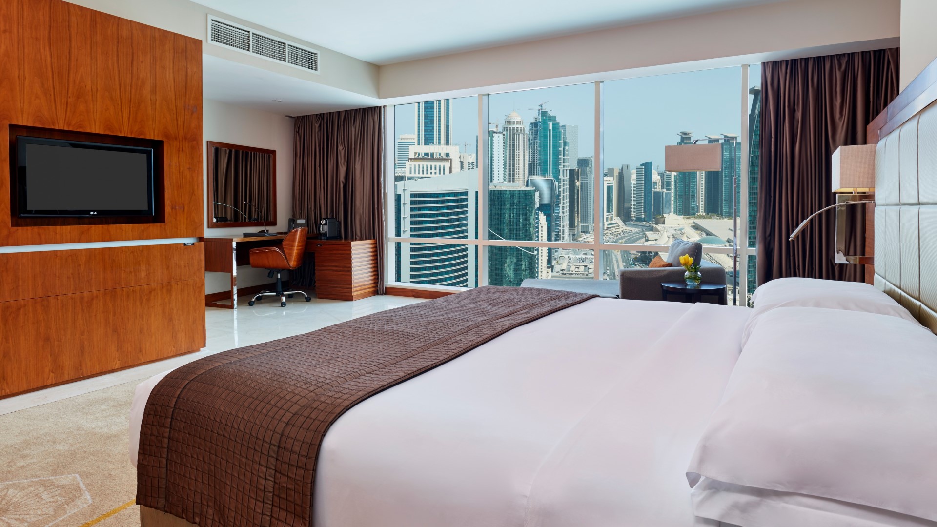 a suite at InterContinental Doha Beach & Spa with large windows