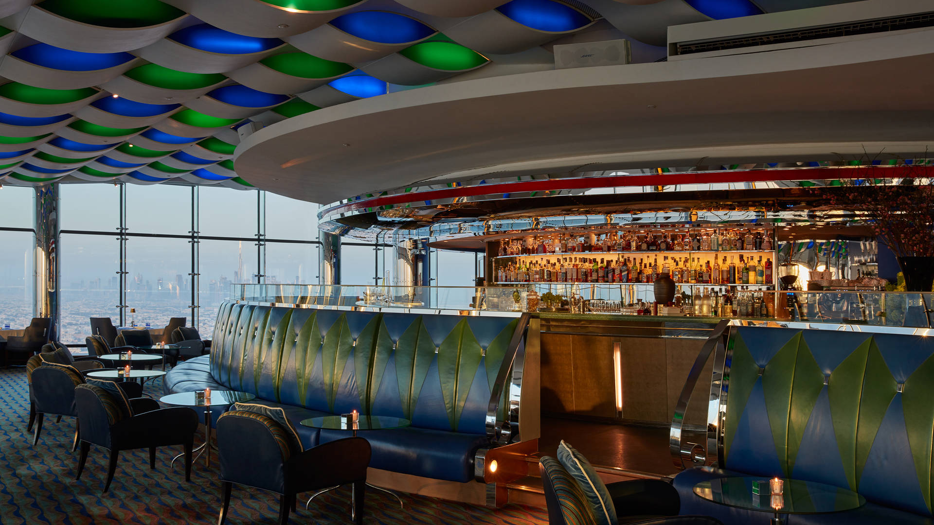 Al muntaha resturant and bar in dubai with blue and green couch