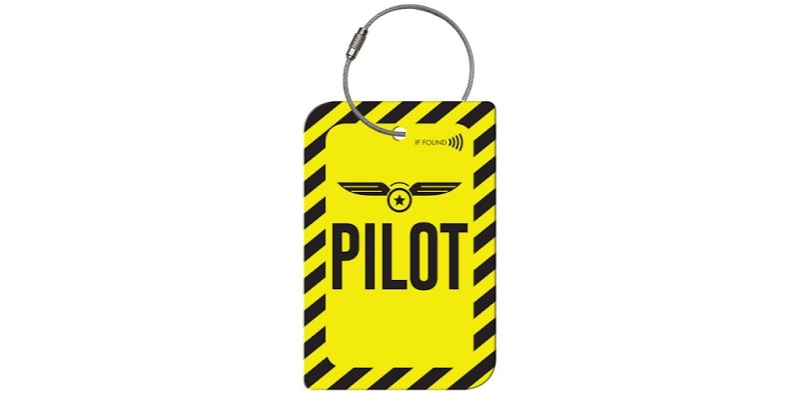 Yellow and black square saying PILOT and a key ring at the top