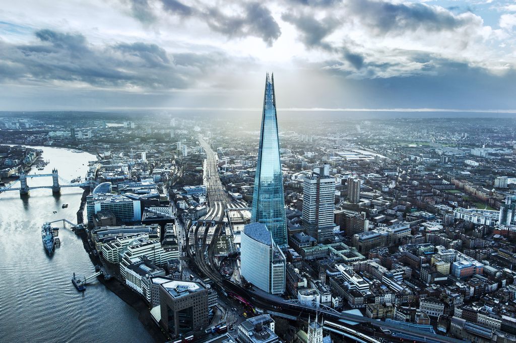 Bird view of the heart of London and the shard, a super tall glass looking building.