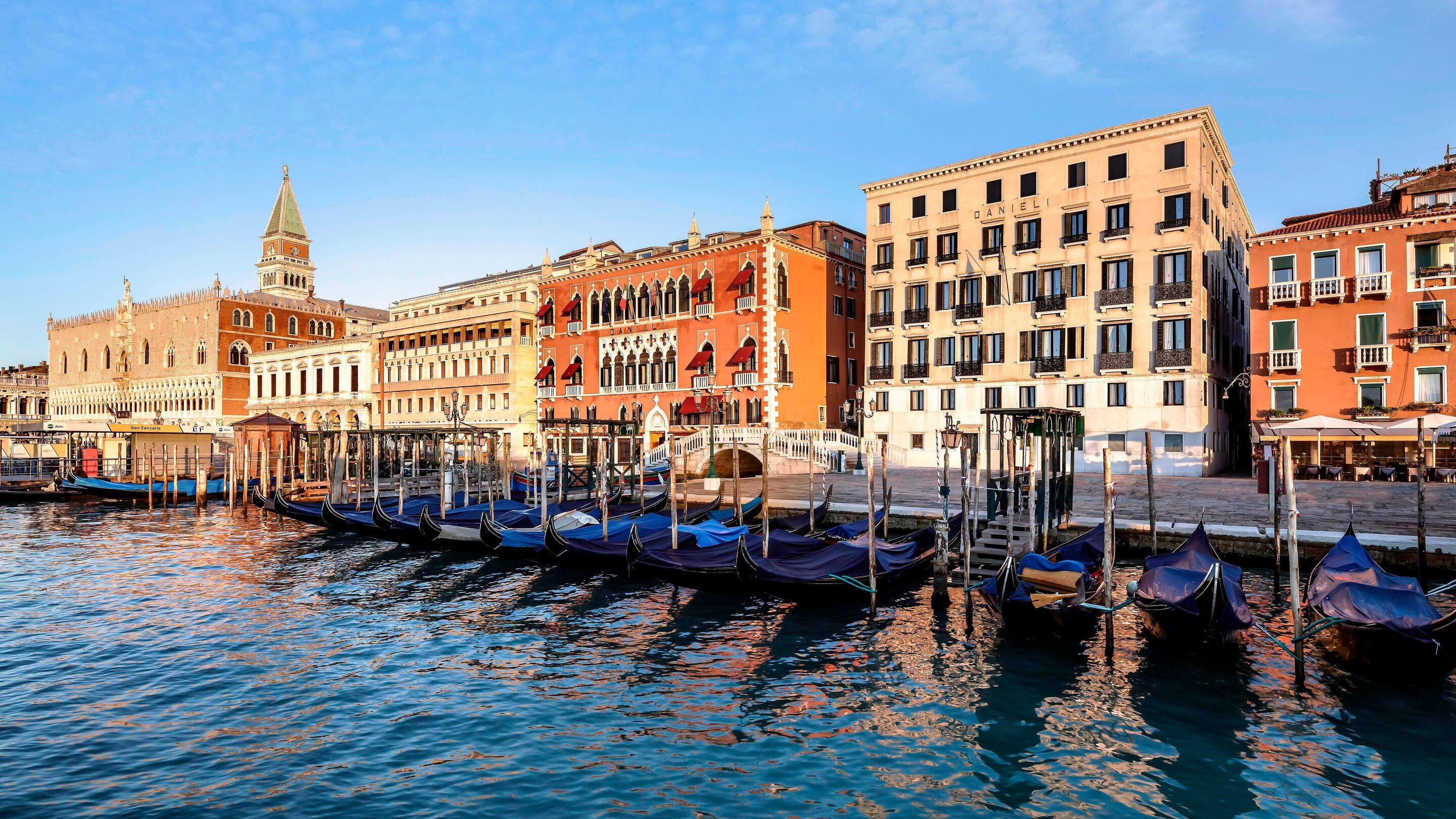 View from the water at Venice to the dock and beautiful biuldings of Venice.