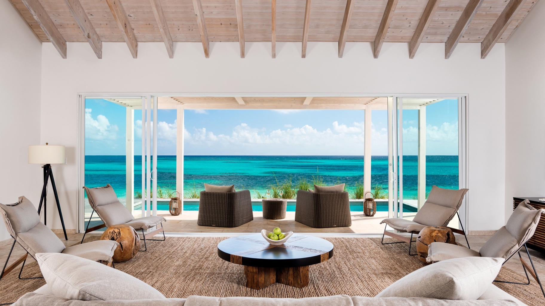 a lounge at The Sailrock Resort, South Caicos over looking the beach