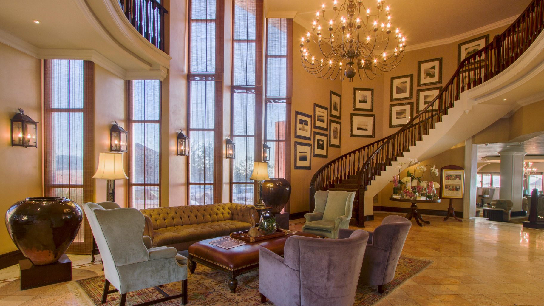 The lounge at The Beverly Hills Hotel with staircase upstairs
