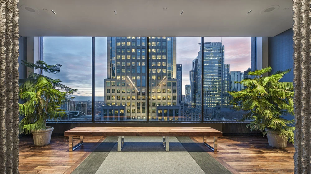 Inside Hotel Bonaventure Montreal with a large wall window with view of the city