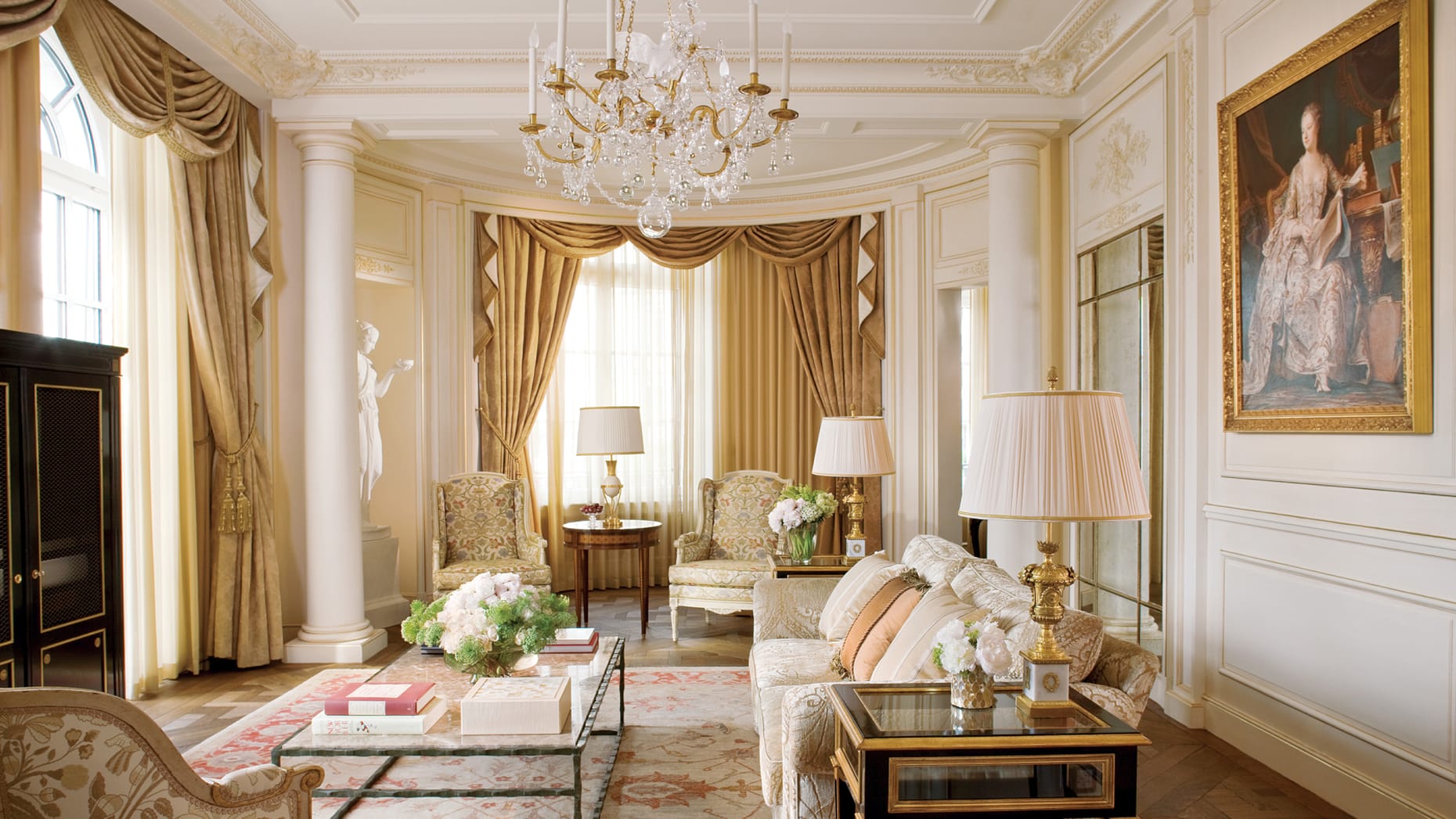 Suite at The Four Seasons Hotel de Bergues in Geneva with gold interior