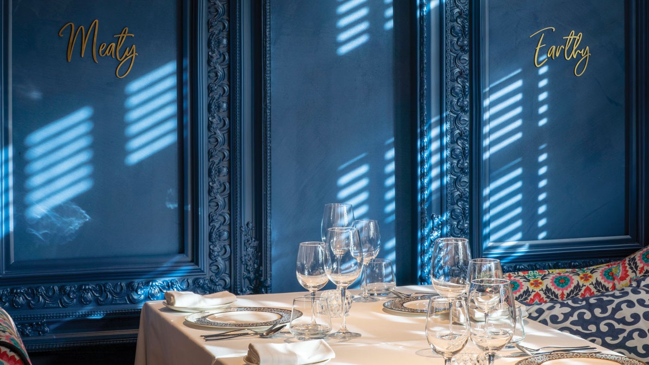 Table at tresind dubai with blue walls