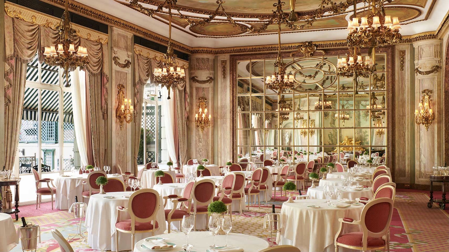 The iconic pink and gold dining area at The Ritz Hotel, in London